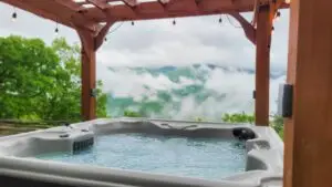 Hot Tub Spa And Smoky Mountains Under Lighted Pergola